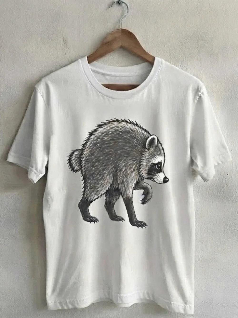 White Shirt with Jimothy Raccoon Graphic Tee
